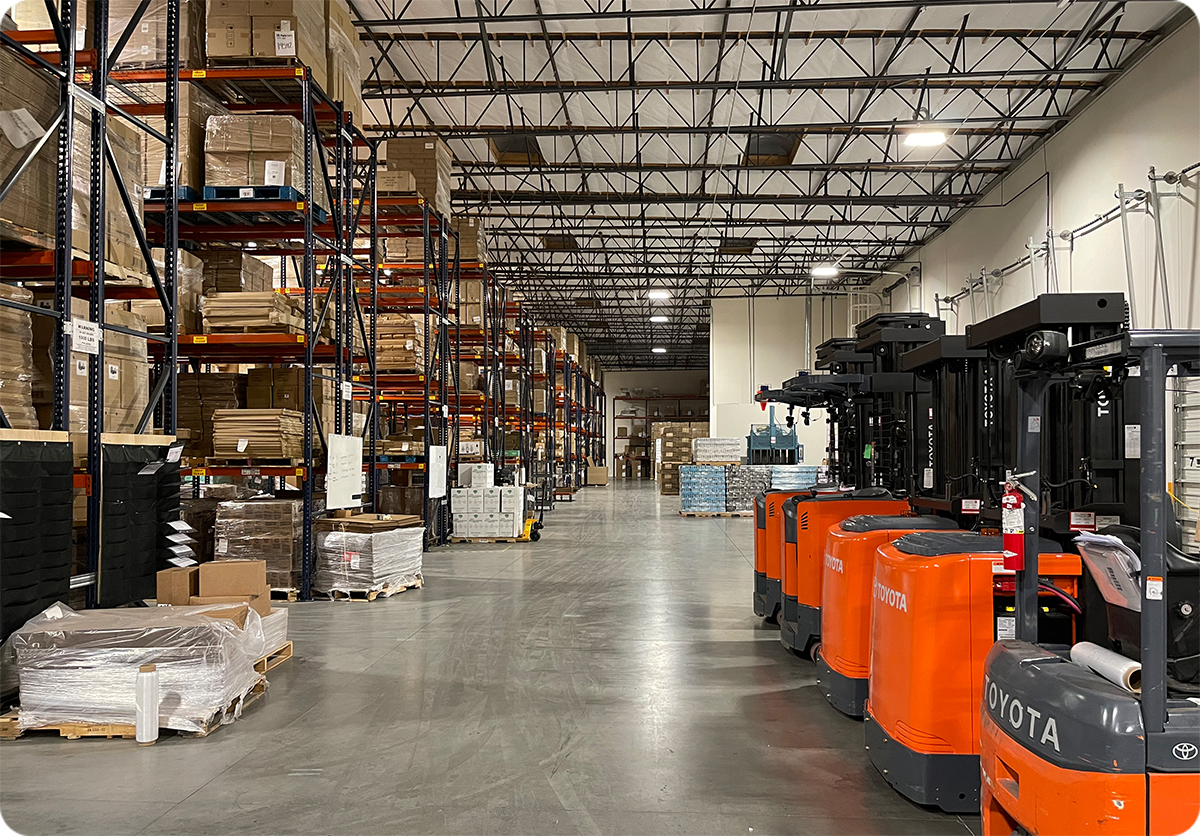 Toyota forklifts and racks in Elevate Fulfillment's warehouse.